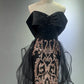 Robe de bal longue noire et dorée NV6623