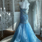 Robe de soirée longue et transparente ornée de délicates broderies féeriques NV6605