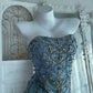 Robe de soirée longue et transparente ornée de délicates broderies féeriques NV6605