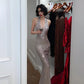 Robe sirène dos nu à sequins gris argenté : décolleté en V plongeant, traîne ajustée, robe de soirée idéale pour un banquet NV6410