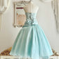 Robe de soirée vert menthe en satin, dos nu, longueur thé, ornée de fleurs NV6545